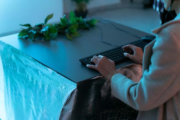Keyboard Landscaper, a musical and visual toy made by Tatiana Vilela dos Santos and Olivier Drouet, exhibited in Belgrade, Serbia as part of an A MAZE. Pop up exhibit. In this game, your keyboard turns into a tone matrix: an electronic musical instrument inspired by Japanese artists Toshio Iwai and Yu Nishibori's Tenori-on. 
The picture shows a keyboard and a mouse on a silver table and two hands above the keyboard.