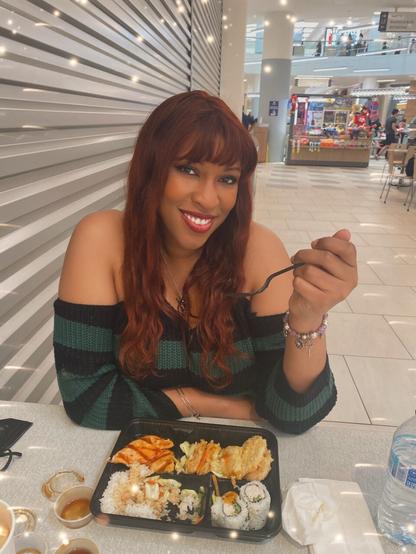 Me eating teriyaki with a sweater on