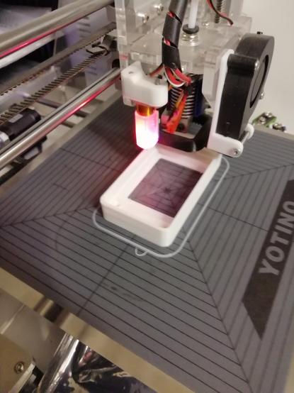 Image showing case front being 3D printed