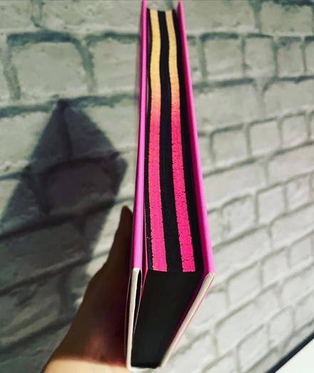 Spredges on Night Crawling by Leila Mottley which show black and pink/yellow striped lines