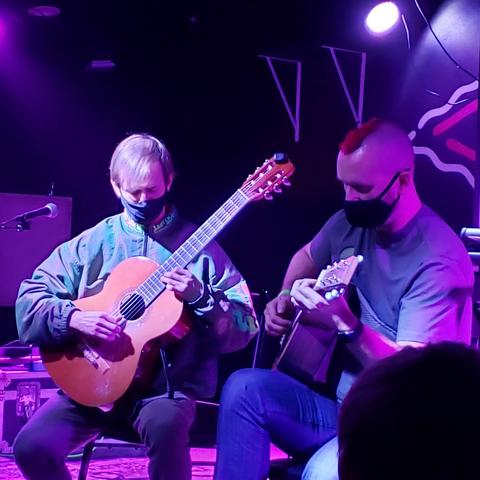The duo Super Guitar Bros on stage at the X-Ray Arcade.