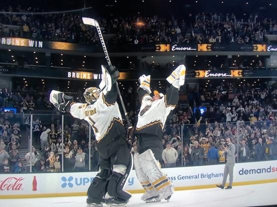 Swayman hugs Ullmark after the Bruins beat the Lightning.