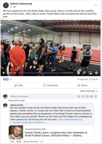 Screenshot of a video of the Peach State Cats football team at an indoor training location. Hunter Lamm, a neo-Nazi, is shown in the crowd.