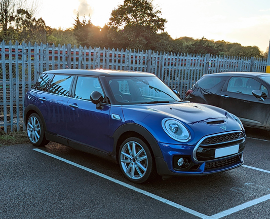 A blue 2018 Mini Clubman.