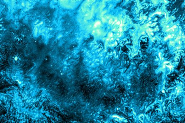 Digital photogram. Photography representing water with different shades of blue present in HTML and CSS.