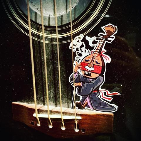 On my dads guitar