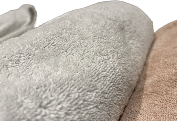 Bath towels rolled after laundry. Meh, not bad. Can do better.