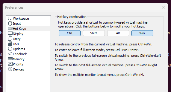screen capture of a VMware "Preferences" panel and showing "Ctrl" and "Win" selected, a change from default "Ctrl" and "Alt".