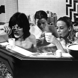 Mick Jagger & Anita Pallenberg & Michelle Breton naked in a tub in a scene from Performance (1970) - they’re having a nice cup of tea.