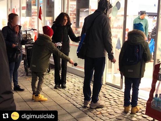 Family makes field recordings in a mall @ deeplistening workshop
