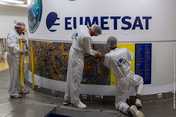 the African Space Art Project painting is pictured on the Ariane 5 rocket in Kourou, French Guyana.