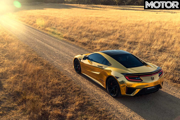 Photo of a gold-wrapped Honda NSX