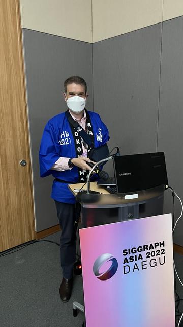 Aaron Quigley as session chair in his 2021 CHI student volunteer happi coat