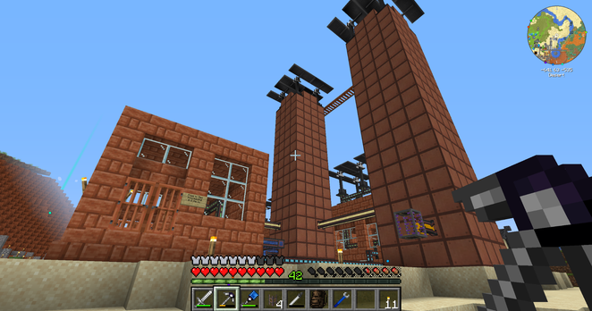 Screenshot from the video game Minecraft, featuring a pair of tall copper buildings (solar evaporators) and a smaller building next door (chemical separation plant).