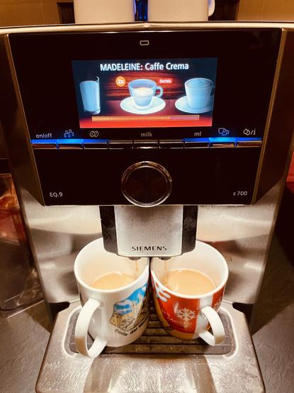 Photo of our coffee maker. Showing 2 cups getting filled the same time.