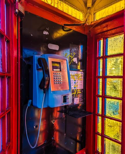 Inside a red telephone box in Coventry City Centre