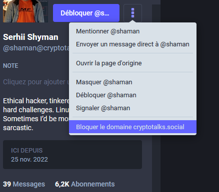 Capture d'écran du profil de quelqu'un sur l'interface web. Le menu est ouvert depuis les 3 petits points à côté du profil et l'option en bas "bloquer le domaine cryptotalks.social" est surlignée.