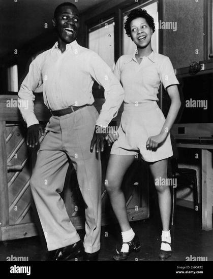 Robinson and Le Gon in a dance pose, side by side