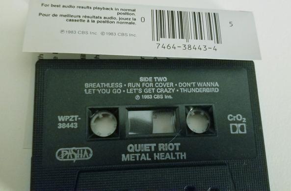 Back of cassette cover for Metal Health by Quiet Riot.  With the cassette tape, side 2 facing up.