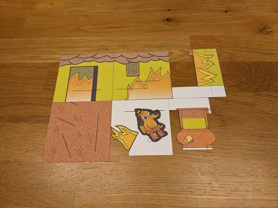 The flat paper, before folding, from which the diorama was built.