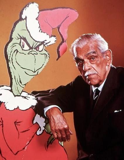 Boris Karloff with a cutout of the Grinch.