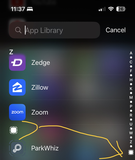 Screenshot of Apple iPhone App Library with yellow arrow pointing to bottom right.
