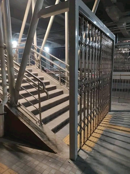A heavy locked security gate that you can just walk around.