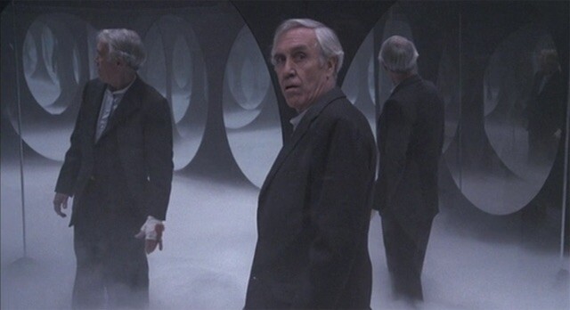 An old man looking back from the house of mirrors