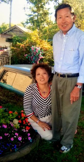 Old photo of my Mom & Dad in front yard.  Circa 1994.