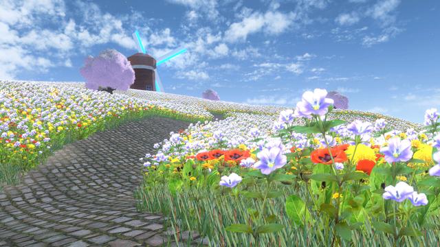 A VRChat world with a field of flowers and a windmill in the distance.