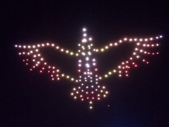 An image of a bird created by a 'swarm' of illuminated drones in the night sky