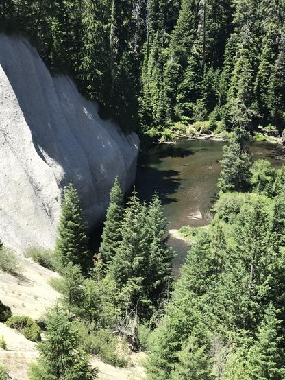 Bend in Upper Rogue River stream course and adjacent pumice exposure in eroded bank.  Color photo from 2017.