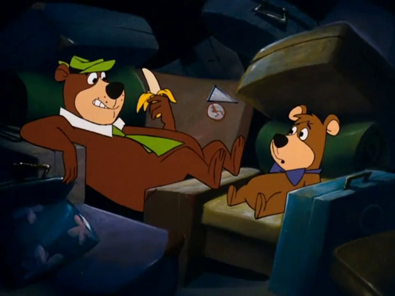 Yogi and Boo-Boo in the luggage hold of a bus.