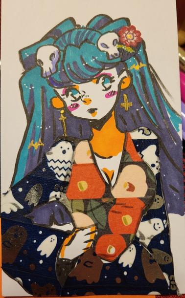 A cute little goth girl in a ghost and flower dress.