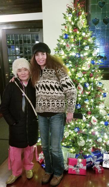 Me & my friend, Nadene, at Butchart Gardens dining room, in front of their Christmas tree.