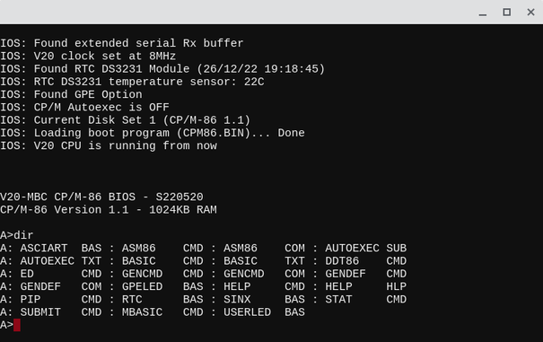 Screenshot of a terminal emulator window running a console command session that shows the output of a file directory listing program.