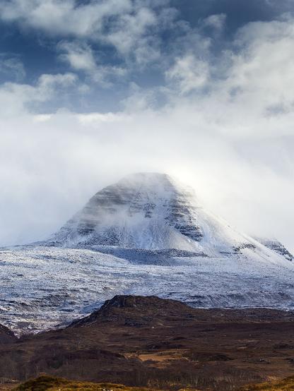 The mountain called "Baosbheinn" near Gairloch, Wester Ross, Scotland wearing a wintry scarf.