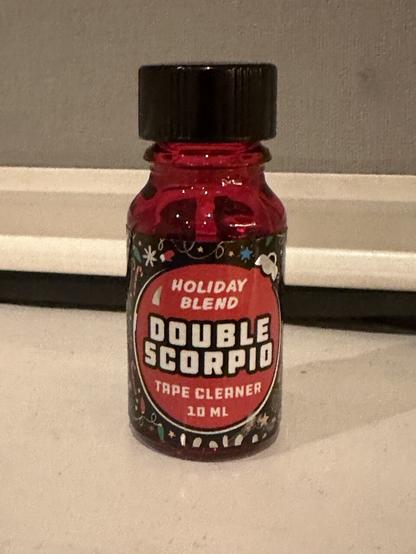 a bottle of “holiday blend” poppers.