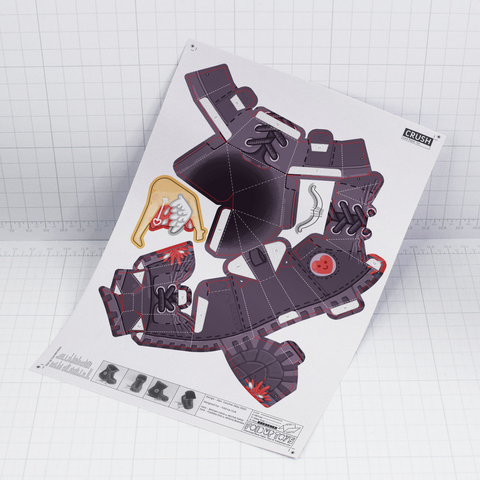 A photo of a papercraft boot crushing a cherub