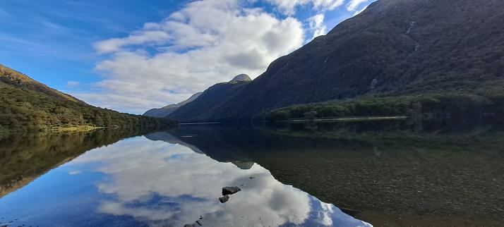 Mountain reflections on a glassy lake