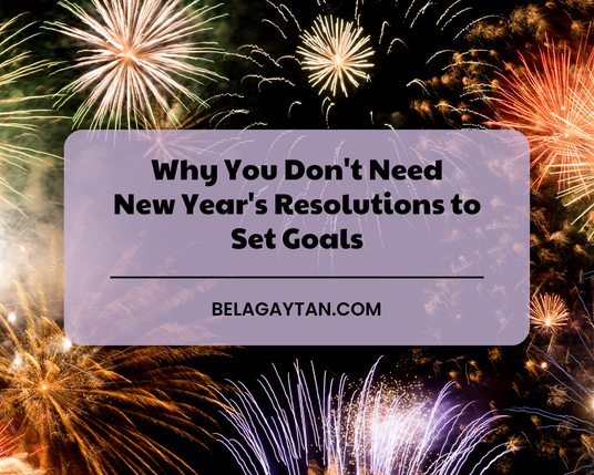 “Why you don’t need new year’s resolutions to set goals” is set on a semi-transparent lilac box with fireworks in the background.