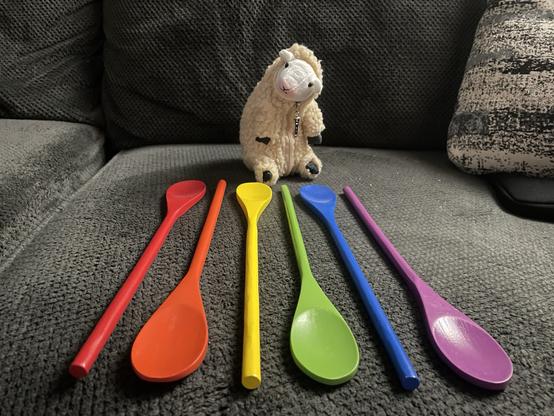 stuffed sheep with rainbow spoons