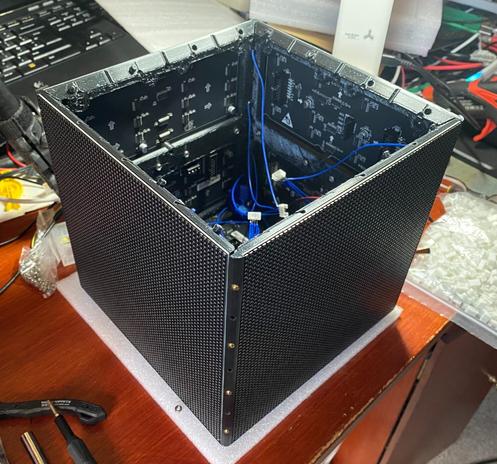 View of an LED cube made from HUB75 LED matrix panels with the top face removed.