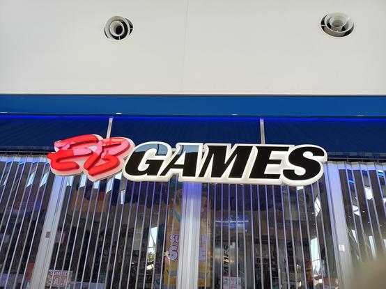 The EB Games sign outside the shop door, which is sadly closed because I'm here super early.