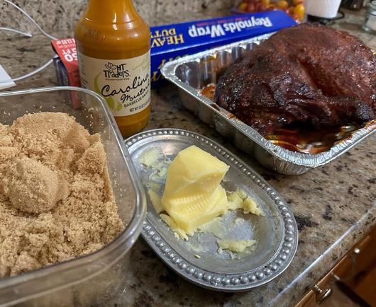 Before wrapping in foil, adding butter, brown sugar, and barbecue sauce