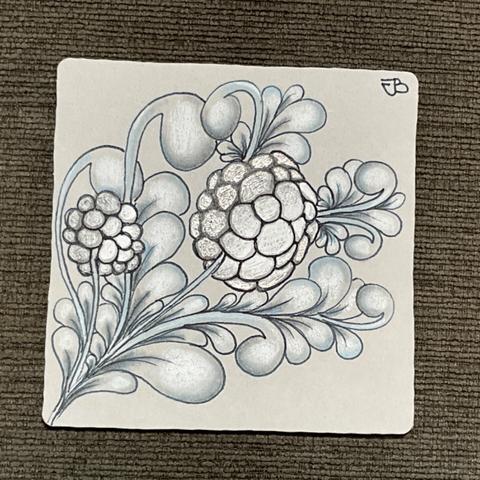 A classic size grey Zentangle tile piece of art. More representational, it has berry and leafy like patterns done in dark blue ink. Graphite is used for shading along with white and blue pastel chalk