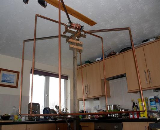 Large 3-loop magentic loop array, built in a kitchen and then too big to take it out!  It stayed here for over a year.