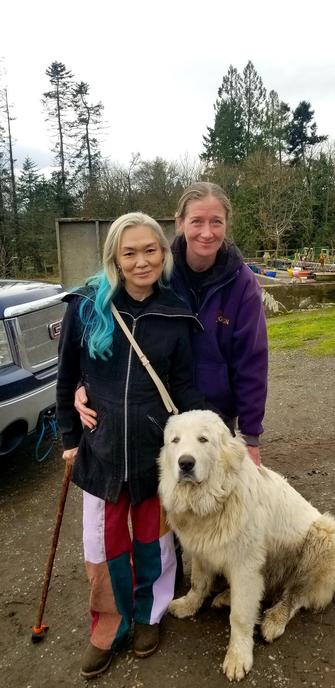 Me & my longtime friend, Morgan, with one of their guardian dogs.