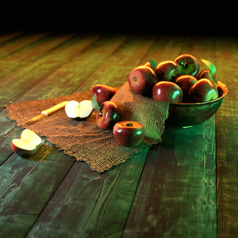 beaten copper bowl filled with apples resting on a worn blue wooden floor, knife resting next to sliced apple on the floor, warm orange light from above, cool green light from right, white light from right