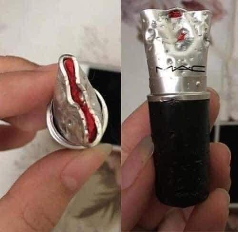 A lipstick that has been chewed up by a kitten.